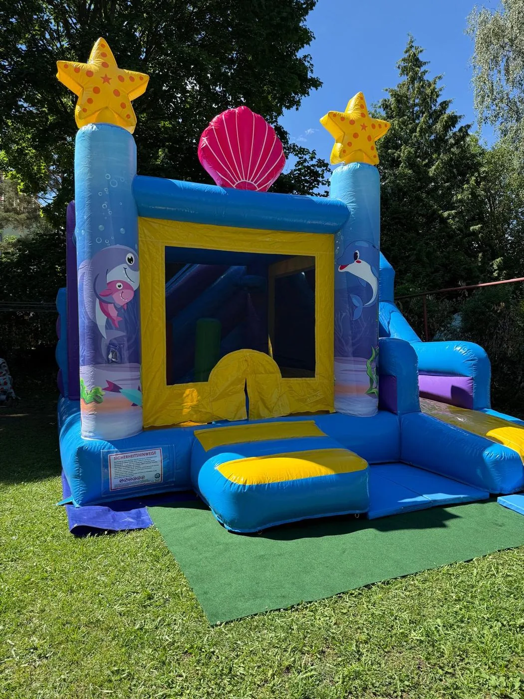 Seestern-Hüpfburg „Rutsche & Multiplay“ im Garten